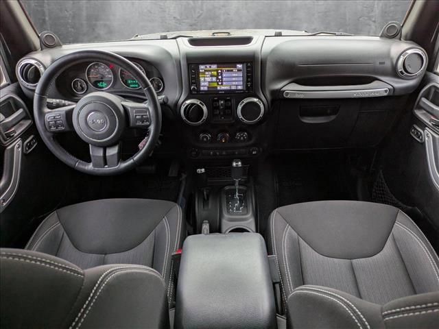 used 2014 Jeep Wrangler Unlimited car, priced at $17,497