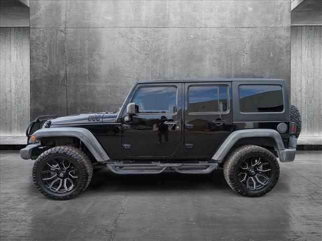 used 2012 Jeep Wrangler Unlimited car, priced at $16,498