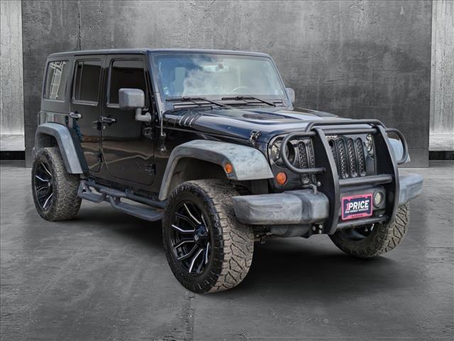 used 2012 Jeep Wrangler Unlimited car, priced at $16,498