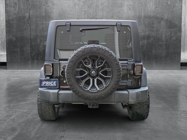 used 2012 Jeep Wrangler Unlimited car, priced at $16,498