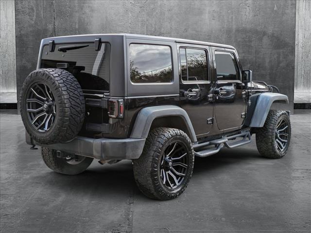 used 2012 Jeep Wrangler Unlimited car, priced at $16,498