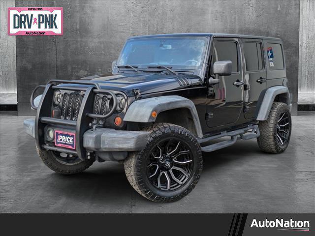 used 2012 Jeep Wrangler Unlimited car, priced at $16,498