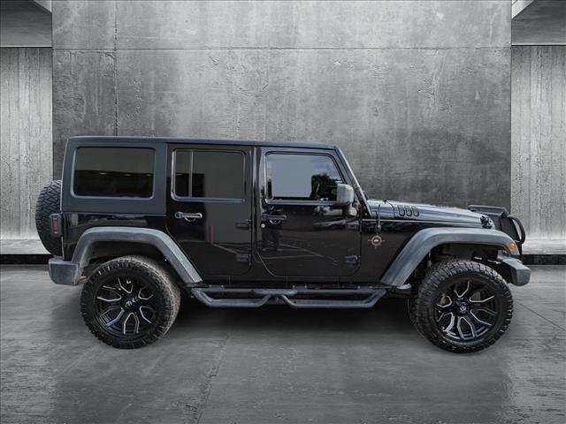 used 2012 Jeep Wrangler Unlimited car, priced at $16,498