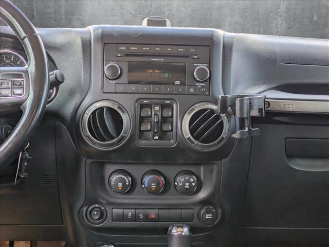 used 2011 Jeep Wrangler Unlimited car, priced at $12,992