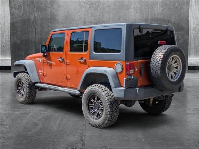 used 2011 Jeep Wrangler Unlimited car, priced at $12,992