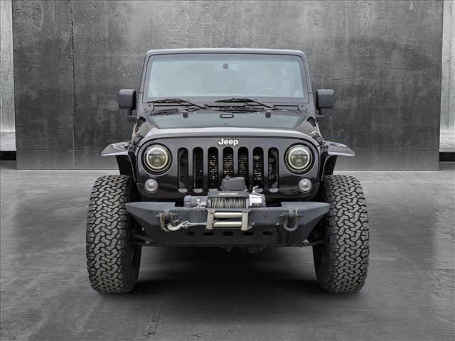 used 2014 Jeep Wrangler Unlimited car, priced at $19,989