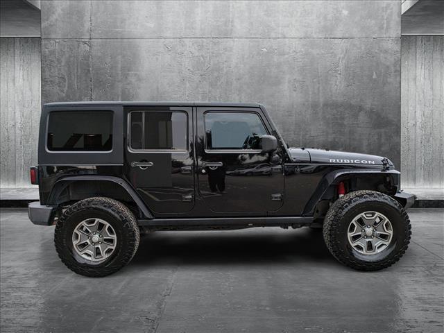 used 2014 Jeep Wrangler Unlimited car, priced at $19,989