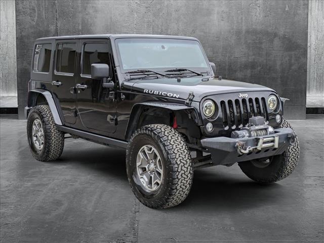 used 2014 Jeep Wrangler Unlimited car, priced at $19,989