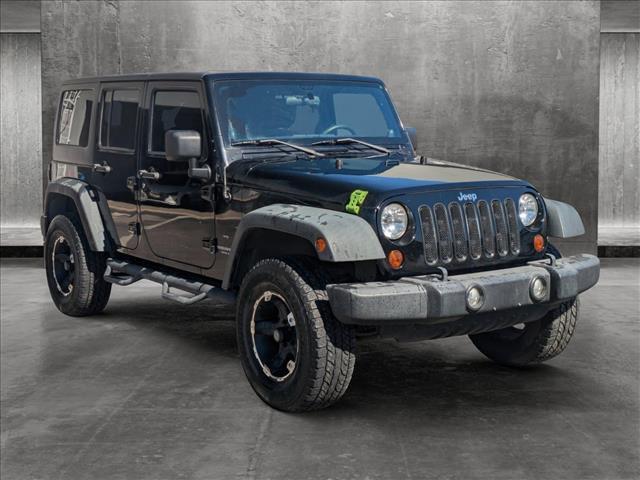 used 2013 Jeep Wrangler Unlimited car, priced at $20,995