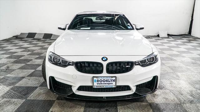 used 2018 BMW M4 car, priced at $51,085