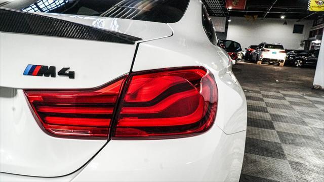 used 2018 BMW M4 car, priced at $51,085