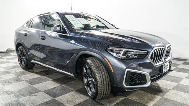 used 2022 BMW X6 car, priced at $56,095