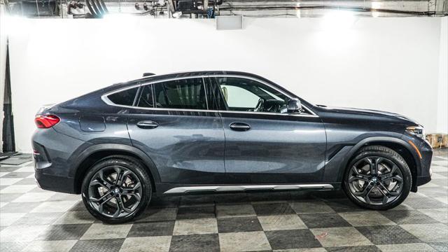 used 2022 BMW X6 car, priced at $56,095