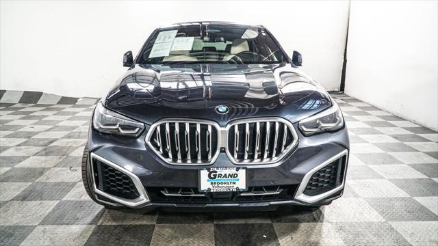 used 2022 BMW X6 car, priced at $56,095