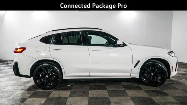 used 2022 BMW X4 car, priced at $34,425