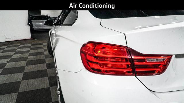 used 2015 BMW M4 car, priced at $40,494