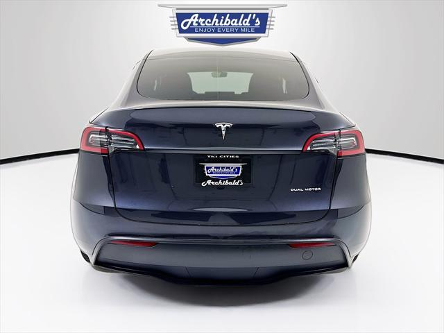 used 2024 Tesla Model Y car, priced at $38,249