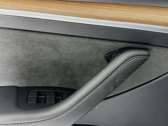 used 2024 Tesla Model Y car, priced at $38,249