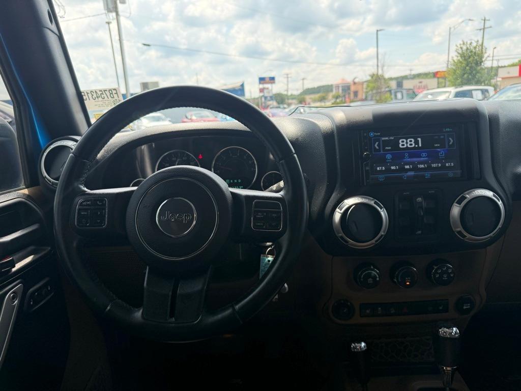 used 2016 Jeep Wrangler Unlimited car, priced at $22,115