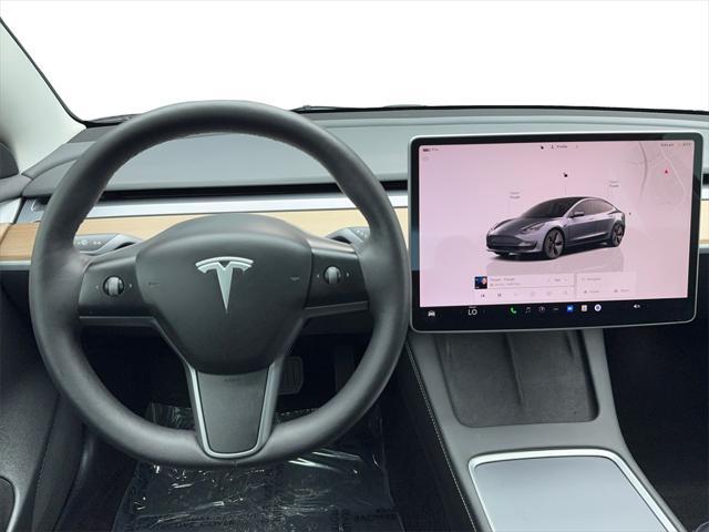used 2023 Tesla Model 3 car, priced at $26,880