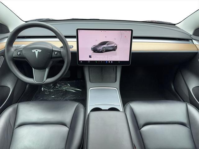 used 2023 Tesla Model 3 car, priced at $26,880
