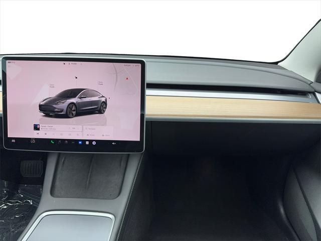 used 2023 Tesla Model 3 car, priced at $26,880