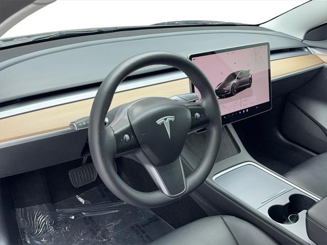used 2023 Tesla Model 3 car, priced at $26,880