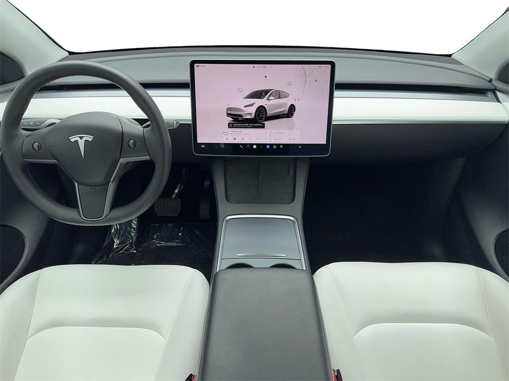 used 2025 Tesla Model Y car, priced at $38,490