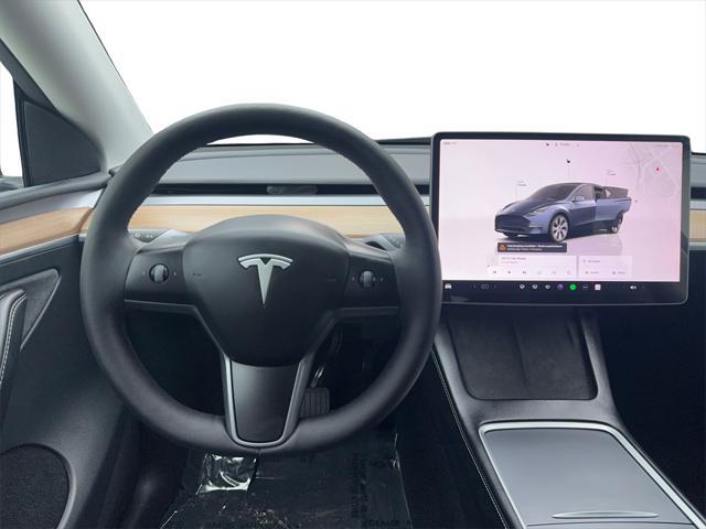 used 2024 Tesla Model Y car, priced at $35,490