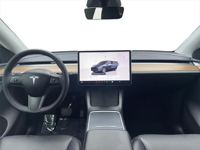 used 2024 Tesla Model Y car, priced at $35,490