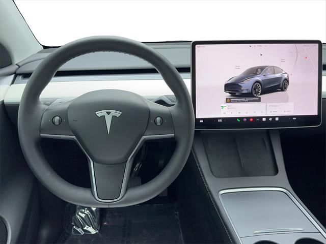 used 2024 Tesla Model Y car, priced at $32,980