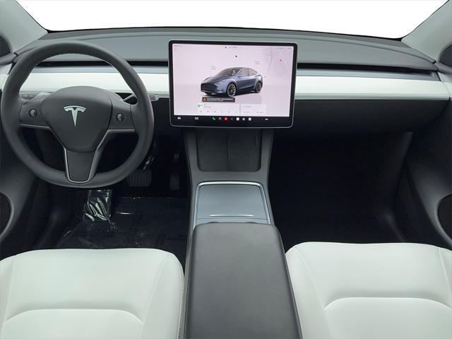 used 2024 Tesla Model Y car, priced at $32,980