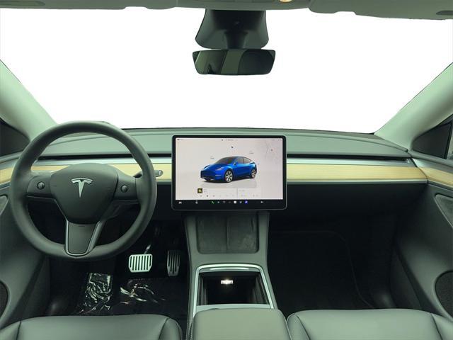 used 2024 Tesla Model Y car, priced at $38,995