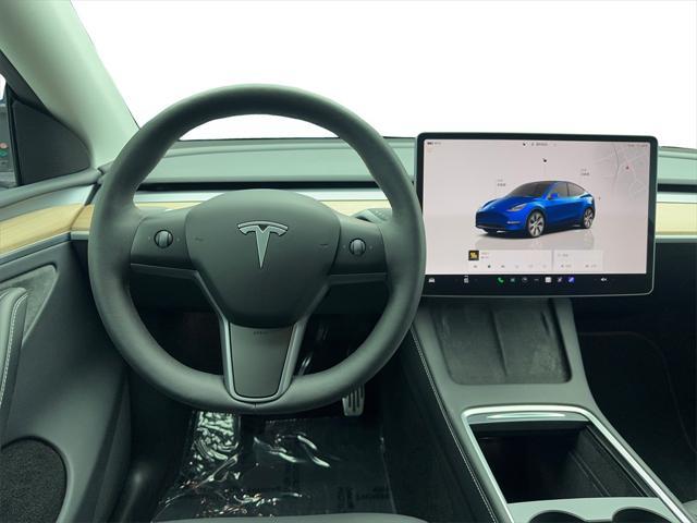 used 2024 Tesla Model Y car, priced at $38,995