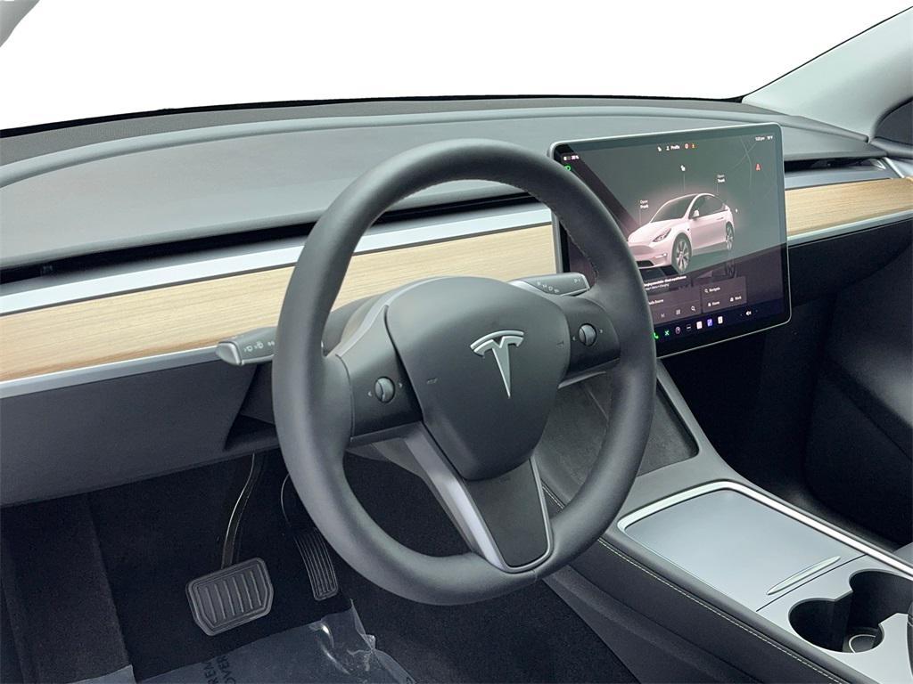 used 2024 Tesla Model Y car, priced at $30,990
