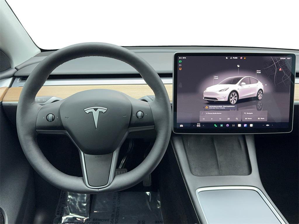 used 2024 Tesla Model Y car, priced at $30,990