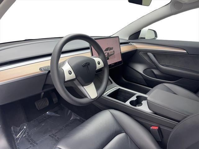 used 2023 Tesla Model 3 car, priced at $25,690