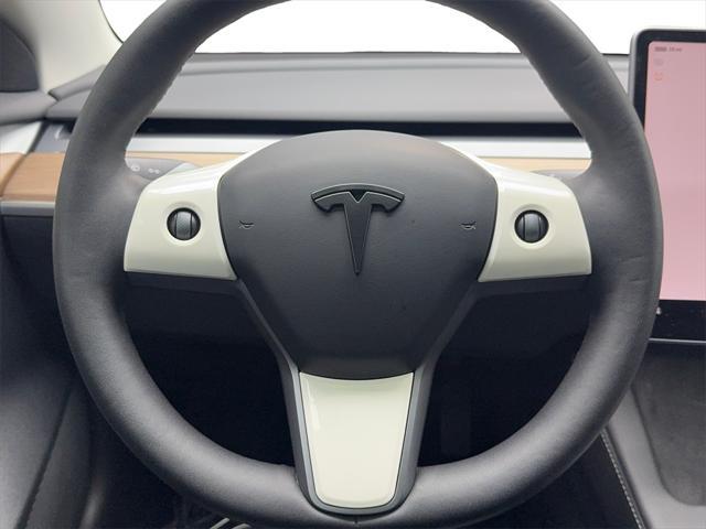 used 2023 Tesla Model 3 car, priced at $25,690