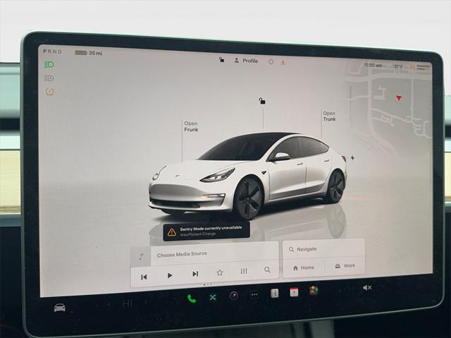 used 2023 Tesla Model 3 car, priced at $25,690