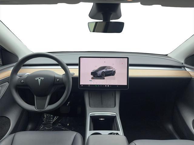 used 2024 Tesla Model Y car, priced at $33,990