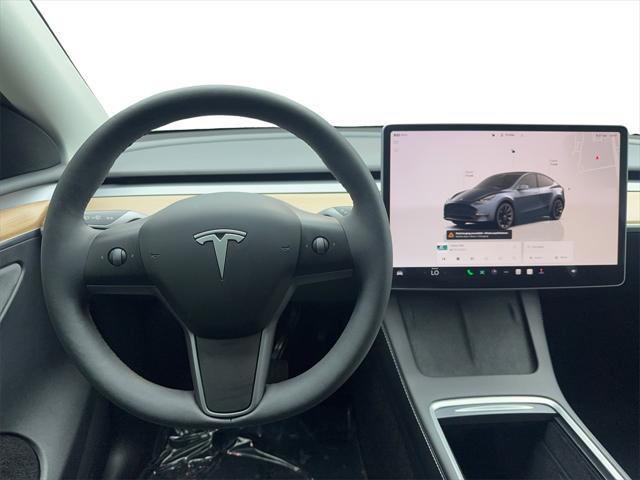 used 2024 Tesla Model Y car, priced at $33,990