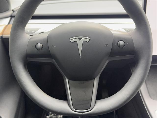 used 2024 Tesla Model Y car, priced at $33,990