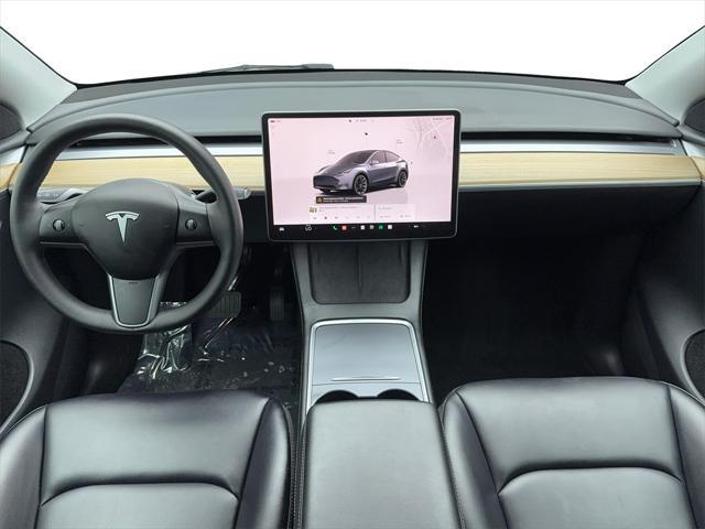 used 2023 Tesla Model Y car, priced at $31,360