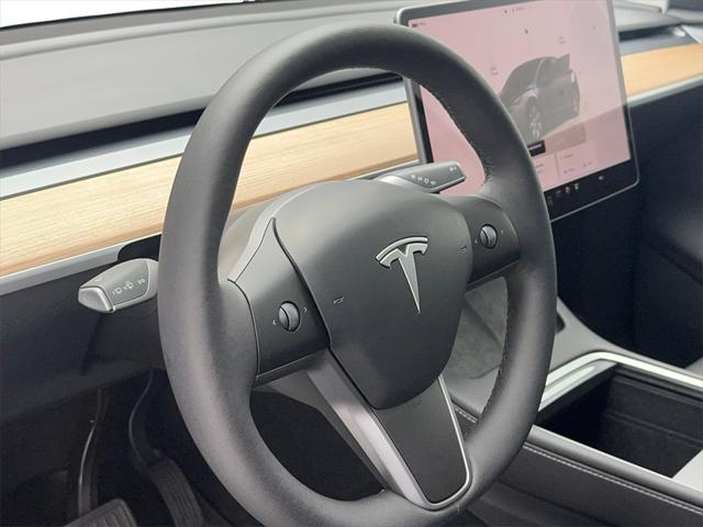 used 2024 Tesla Model Y car, priced at $34,999