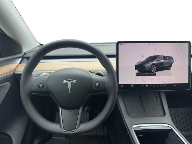 used 2024 Tesla Model Y car, priced at $34,999