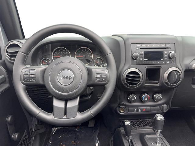 used 2015 Jeep Wrangler Unlimited car, priced at $20,995