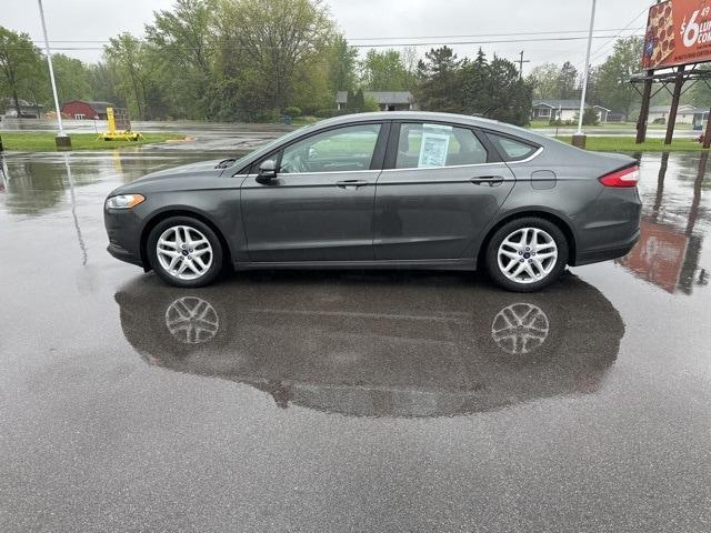used 2016 Ford Fusion car, priced at $10,779