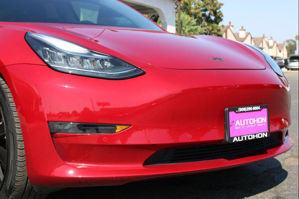 used 2018 Tesla Model 3 car, priced at $23,000
