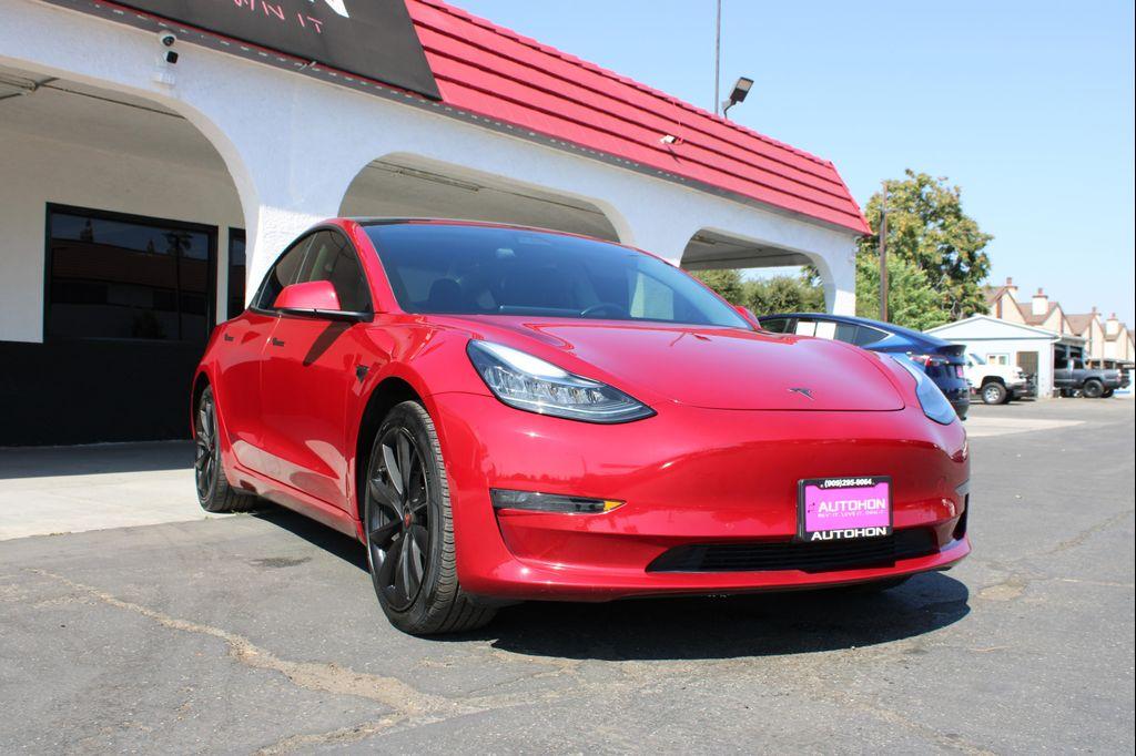 used 2018 Tesla Model 3 car, priced at $23,000