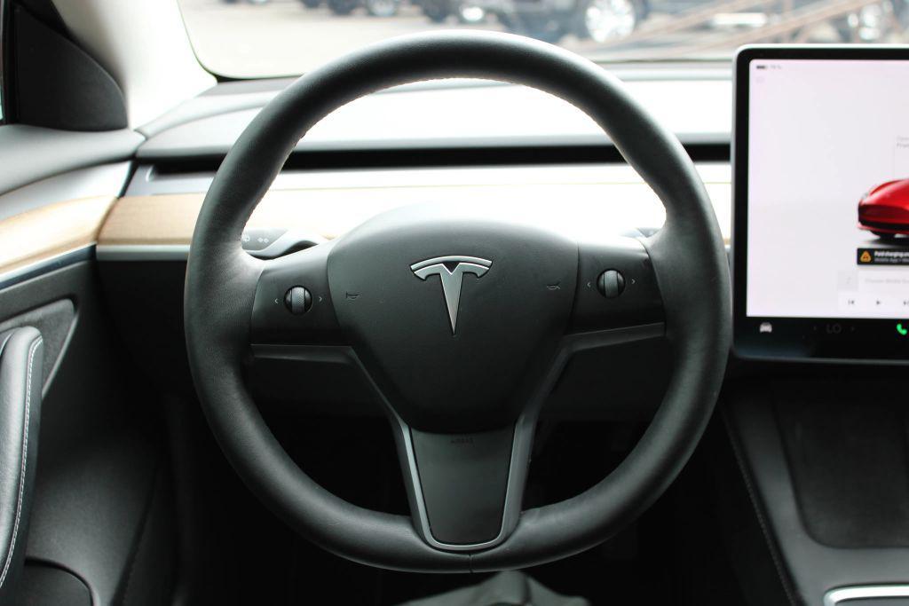 used 2022 Tesla Model 3 car, priced at $24,600